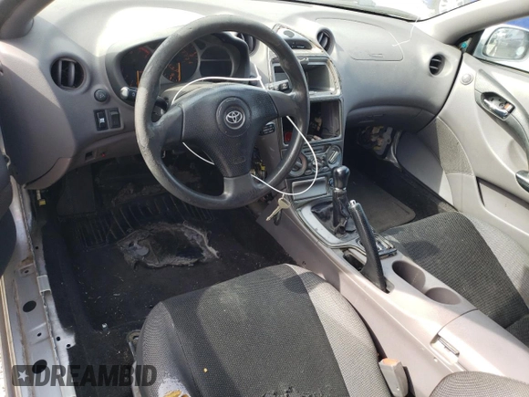 2002 Toyota Celica GT z VIN JTDDR32T320129918, wystawiony jako Copart lot #53359895 z przebiegiem 161 340 mil mil oraz Szkoda całkowita • Salvage title. Historia ofert i sprzedaży dostępna na DreamBid. Obrazek 8.