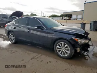 2015 Infiniti Q50 Premium with VIN JN1BV7AP6FM335248, listed as a Copart auction lot 61015275 with 117,227 mi miles and Clean title. Bid and sale history available at DreamBid. Image 4.