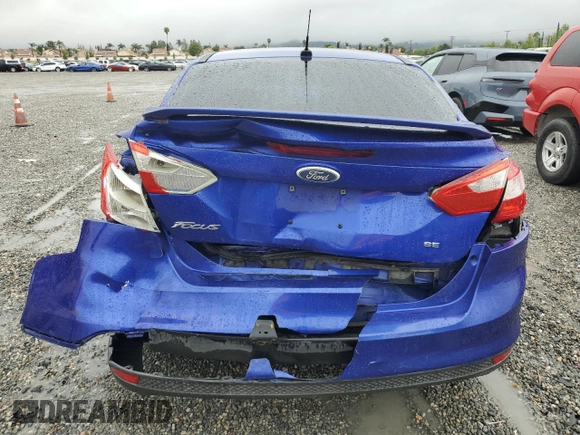 2013 Ford Focus SE with VIN 1FADP3F24DL164398, listed as a Copart auction lot 54579505 with 157,880 mi miles and Salvage title. Bid and sale history available at DreamBid. Image 6.