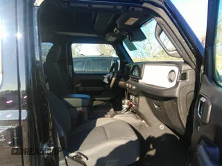 2024 Jeep Wrangler Sport S with VIN 1C4PJXDG3RW266909, listed as a IAAI auction lot 41242792 with 6,132 mi miles and . Bid and sale history available at DreamBid. Image 5.