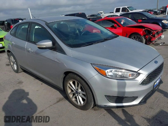 2015 Ford Focus SE with VIN 1FADP3F2XFL340583, listed as a IAAI auction lot 42099224 with 111,970 mi miles. Bid and sale history available at carsss.com. Image 1.