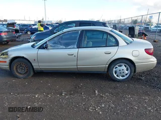 2002 Saturn SL with VIN 1G8ZK52752Z194235, listed as a IAAI auction lot 41792837 with 152,337 mi miles. Bid and sale history available at carsss.com. Image 14.