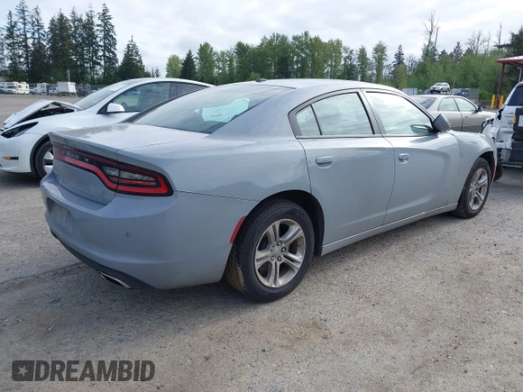 2022 Dodge Charger SXT with VIN 2C3CDXBG4NH201640, listed as a IAAI auction lot 42161657 with 48,690 mi miles and . Bid and sale history available at DreamBid. Image 4.