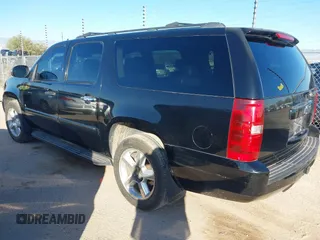 2007 Chevrolet Suburban LT with VIN 1GNFC16037R407726, listed as a IAAI auction lot 41480221 with 247,857 mi miles and . Bid and sale history available at DreamBid. Image 3.