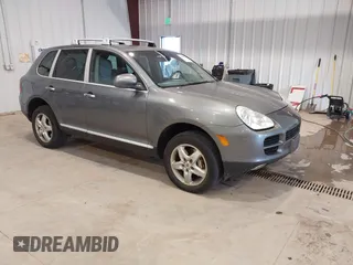 2004 Porsche Cayenne S with VIN WP1AB29P54LA69098, listed as a IAAI auction lot 41619941 with 236,820 mi miles. Bid and sale history available at carsss.com. Image 1.