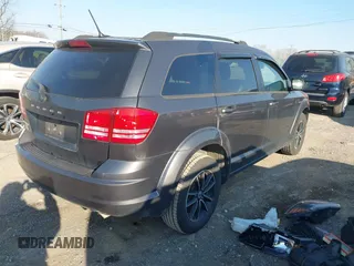 2018 Dodge Journey SE with VIN 3C4PDCAB4JT295807, listed as a IAAI auction lot 41743064 with 105,836 mi miles and . Bid and sale history available at DreamBid. Image 4.