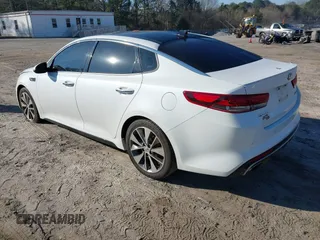 2016 Kia Optima SX Turbo with VIN 5XXGW4L2XGG084628, listed as a IAAI auction lot 41668592 with 116,535 mi miles and . Bid and sale history available at carsss.com. Image 3.