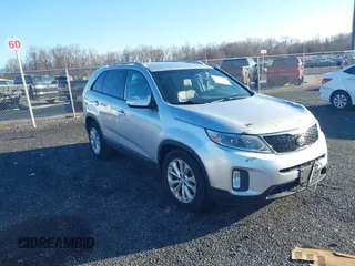 2015 Kia Sorento EX with VIN 5XYKUDA74FG634947, listed as a IAAI auction lot 41836214 with 122,337 mi miles and . Bid and sale history available at DreamBid. Image 1.