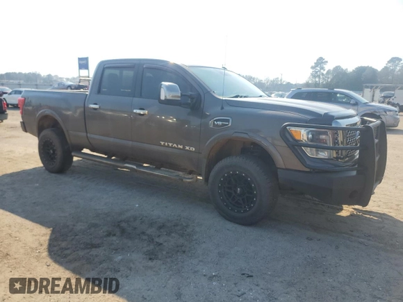 2016 Nissan Titan XD S with VIN 1N6AA1F40GN514555, listed as a Copart auction lot 46584855 with 312,334 mi miles and Salvage Title. Bid and sale history available at carsss.com. Image 4.