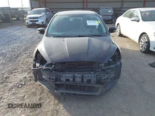 2016 Ford Focus SE z VIN 1FADP3FEXGL310270, wystawiony jako IAAI lot #40956503 z przebiegiem 156 812 mil mil oraz . Historia ofert i sprzedaży dostępna na DreamBid. Obrazek 13.