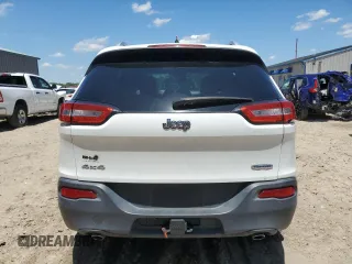 2014 Jeep Cherokee Latitude with VIN 1C4PJMCS6EW244336, listed as a Copart auction lot 52597835 with 167,266 mi miles and Salvage Title. Bid and sale history available at DreamBid. Image 6.