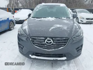 2016 Mazda CX-5 Grand Touring with VIN JM3KE4DY2G0913412, listed as a IAAI auction lot 41616132 with 85,166 mi miles. Bid and sale history available at carsss.com. Image 6.