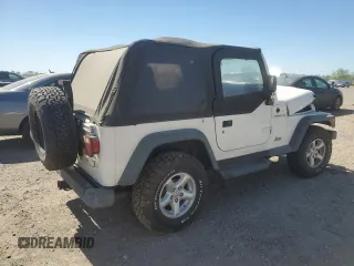 1997 Jeep Wrangler SE with VIN 1J4FY29PXVP411817, listed as a Copart auction lot 48755615 with 125,284 mi miles and Salvage Title. Bid and sale history available at DreamBid. Image 3.