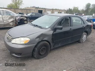 2007 Toyota Corolla CE z VIN JTDBR32E870102164, wystawiony jako IAAI lot #42213578 z przebiegiem 165 973 mil mil oraz . Historia ofert i sprzedaży dostępna na DreamBid. Obrazek 18.