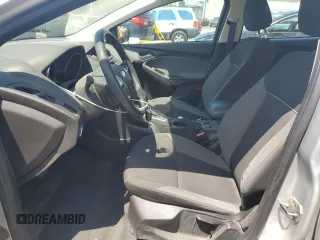 2012 Ford Focus SE z VIN 1FAHP3K2XCL270196, wystawiony jako Copart lot #57319575 z przebiegiem 80 364 mil mil oraz Szkoda całkowita • Salvage title. Historia ofert i sprzedaży dostępna na DreamBid. Obrazek 7.
