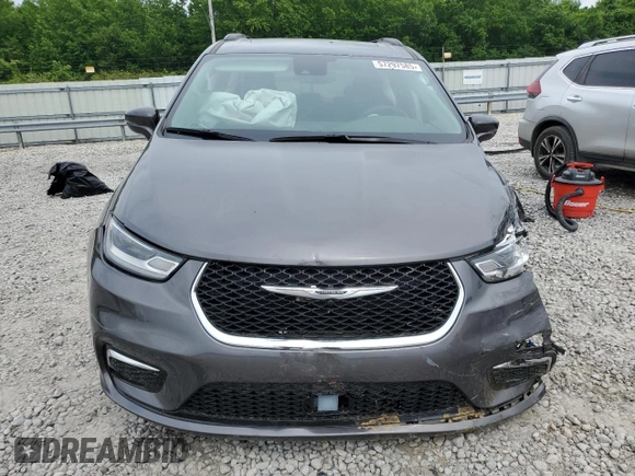 2021 Chrysler Pacifica Touring with VIN 2C4RC1FGXMR550164, listed as a Copart auction lot 57297585 with 10,222 mi miles and Salvage title. Bid and sale history available at DreamBid. Image 5.