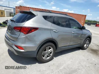 2018 Hyundai Santa Fe 2.4L z VIN 5XYZU3LB2JG519430, wystawiony jako Copart lot #61460755 z przebiegiem 41 746 mil mil oraz Nie do naprawy • Non repairable. Historia ofert i sprzedaży dostępna na DreamBid. Obrazek 3.