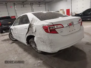 2014 Toyota Camry L with VIN 4T1BF1FK4EU734657, listed as a IAAI auction lot 41963449 with 167,826 mi miles. Bid and sale history available at carsss.com. Image 3.