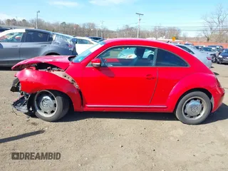 2012 Volkswagen Beetle 2.5L PZEV with VIN 3VWJP7AT5CM631505, listed as a IAAI auction lot 41733955 with 35,519 mi miles. Bid and sale history available at carsss.com. Image 14.