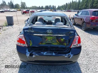 2009 Kia Spectra EX z VIN KNAFE221795624968, wystawiony jako IAAI lot #42406286 z przebiegiem 156 297 mil mil oraz . Historia ofert i sprzedaży dostępna na DreamBid. Obrazek 16.