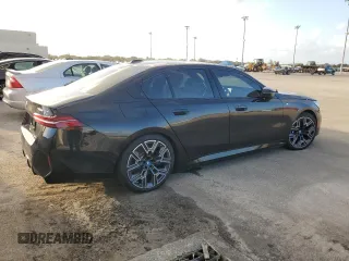2024 BMW i5 M60 z VIN WBY43FK00RCP12947, wystawiony jako Copart lot #79117974 z przebiegiem Nie podano mil oraz Szkody całkowita. Historia ofert i sprzedaży dostępna na DreamBid. Obrazek 3.