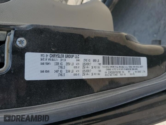 2015 Dodge Grand Caravan SE with VIN 2C4RDGBGXFR567989, listed as a Copart auction lot 55783925 with 275,012 mi miles and Salvage Title. Bid and sale history available at DreamBid. Image 13.