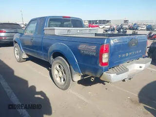 2001 Nissan Frontier 4WD SVE SuperCharger with VIN 1N6MD26Y11C368926, listed as a IAAI auction lot 41054779 with 182,621 mi miles. Bid and sale history available at carsss.com. Image 3.