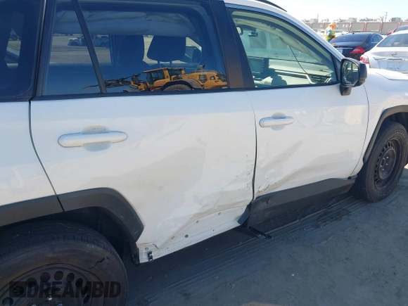 2019 Toyota RAV4 LE with VIN JTMH1RFV4KJ015962, listed as a IAAI auction lot 42714711 with 26,089 mi miles and . Bid and sale history available at DreamBid. Image 6.