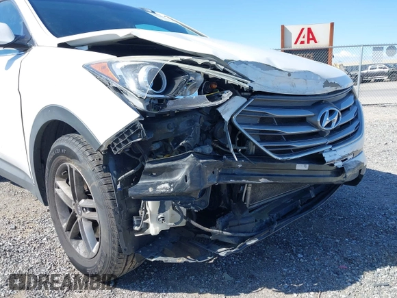 2017 Hyundai Santa Fe 2.4L z VIN 5NMZU3LB1HH045714, wystawiony jako IAAI lot #41949139 z przebiegiem 151 799 mil mil oraz . Historia ofert i sprzedaży dostępna na DreamBid. Obrazek 6.