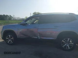 2021 Volkswagen Atlas SE z VIN 1V2LP2CA1MC538847, wystawiony jako IAAI lot #42134093 z przebiegiem 66 678 mil mil oraz . Historia ofert i sprzedaży dostępna na DreamBid. Obrazek 14.