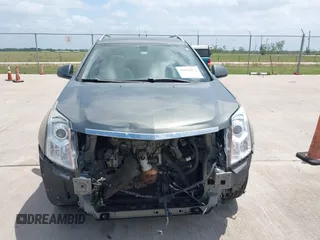 2013 Cadillac SRX Luxury Collection z VIN 3GYFNCE39DS542125, wystawiony jako IAAI lot #42067672 z przebiegiem 158 013 mil mil oraz . Historia ofert i sprzedaży dostępna na DreamBid. Obrazek 6.