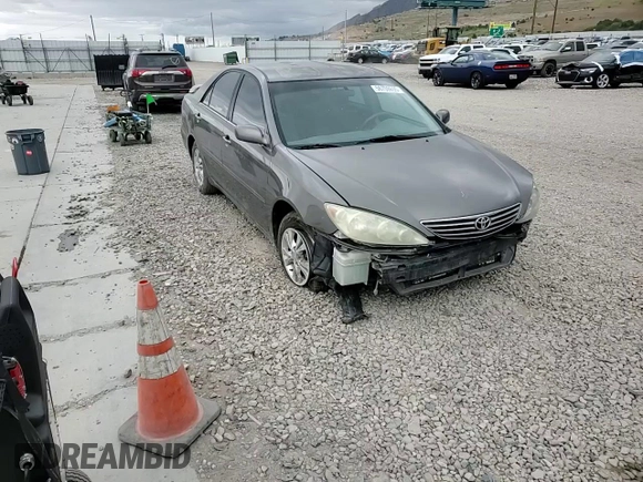 2005 Toyota Camry LE with VIN 4T1BE30K95U966890, listed as a Copart auction lot 56708695 with Not provided miles and Salvage title. Bid and sale history available at DreamBid. Image 14.