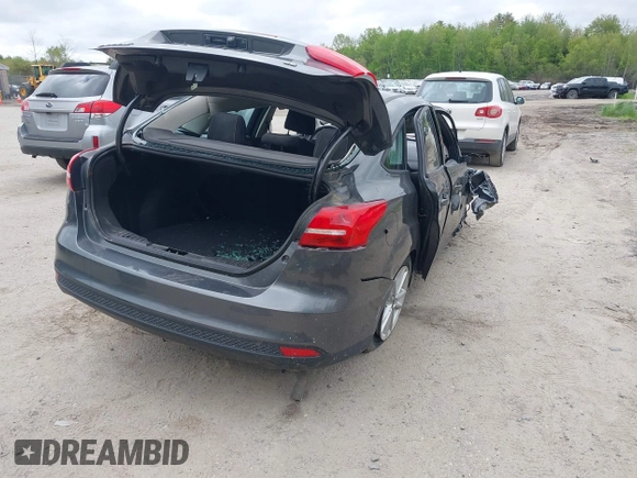 2016 Ford Focus SE z VIN 1FADP3F22GL327604, wystawiony jako IAAI lot #42319889 z przebiegiem 97 736 mil mil oraz . Historia ofert i sprzedaży dostępna na DreamBid. Obrazek 4.