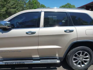 2015 Jeep Grand Cherokee Limited with VIN 1C4RJFBG2FC643264, listed as a IAAI auction lot 42151555 with 116,797 mi miles. Bid and sale history available at carsss.com. Image 14.