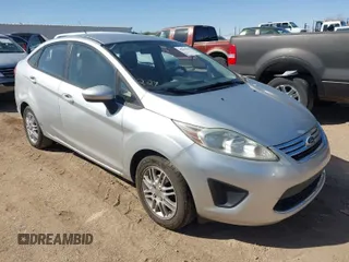 2011 Ford Fiesta SE with VIN 3FADP4BJ4BM177814, listed as a IAAI auction lot 41694964 with 180,565 mi miles. Bid and sale history available at carsss.com. Image 1.