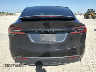 2023 Tesla Model X with VIN 7SAXCDE5XPF422163, listed as a Copart auction lot 52573185 with Not Provided miles and Salvage Title. Bid and sale history available at DreamBid. Image 6.