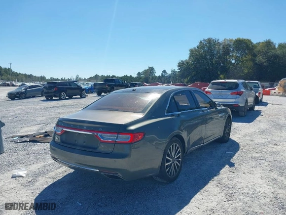 2017 Lincoln Continental Select with VIN 1LN6L9TK1H5617355, listed as a IAAI auction lot 40404909 with 108,208 mi miles. Bid and sale history available at carsss.com. Image 4.