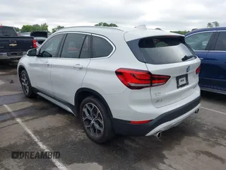 2021 BMW X1 xDrive28i with VIN WBXJG9C01M5S06181, listed as a IAAI auction lot 42292167 with 55,966 mi miles and . Bid and sale history available at DreamBid. Image 3.