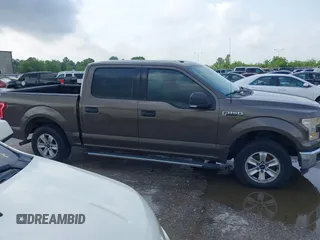 2015 Ford F-150 XLT with VIN 1FTEW1C81FKD15088, listed as a IAAI auction lot 42044616 with 159,248 mi miles and . Bid and sale history available at carsss.com. Image 13.