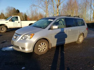 2010 Honda Odyssey EX-L with VIN 5FNRL3H60AB012029, listed as a Copart auction lot 41466155 with 175,048 mi miles and Salvage Title. Bid and sale history available at carsss.com. Image 1.