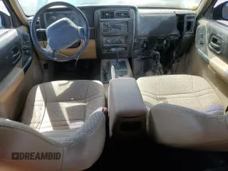 2001 Jeep Cherokee Sport with VIN 1J4FF48S91L610463, listed as a Copart auction lot 59601495 with Not provided miles and Salvage title. Bid and sale history available at DreamBid. Image 8.