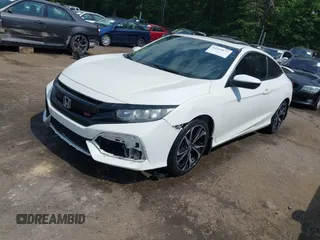 2018 Honda Civic Si z VIN 2HGFC3A54JH755941, wystawiony jako IAAI lot #42269677 z przebiegiem 99 627 mil mil oraz . Historia ofert i sprzedaży dostępna na DreamBid. Obrazek 17.