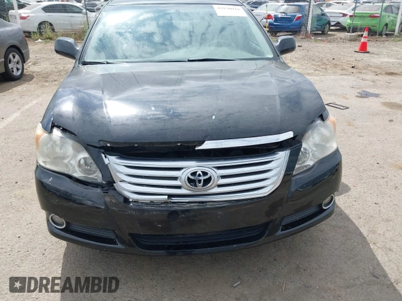 2009 Toyota Avalon XL with VIN 4T1BK36B79U327316, listed as a IAAI auction lot 42130918 with 184,948 mi miles. Bid and sale history available at carsss.com. Image 6.