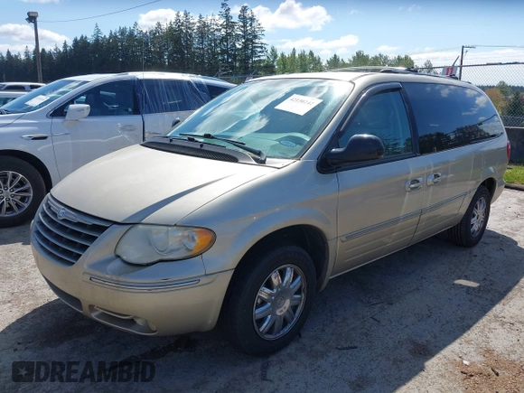 2005 Chrysler Town & Country Limited with VIN 2C8GP64L65R323207, listed as a IAAI auction lot 42150242 with 80,305 mi miles. Bid and sale history available at carsss.com. Image 2.
