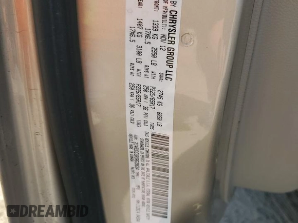 2013 Dodge Grand Caravan SXT with VIN 2C4RDGCG0DR639634, listed as a Copart auction lot 52548075 with 27,799 mi miles and Salvage Title. Bid and sale history available at DreamBid. Image 16.