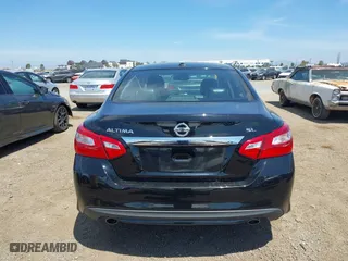2017 Nissan Altima 2.5 SR with VIN 1N4AL3AP9HC151928, listed as a IAAI auction lot 42020334 with 136,101 mi miles. Bid and sale history available at carsss.com. Image 16.