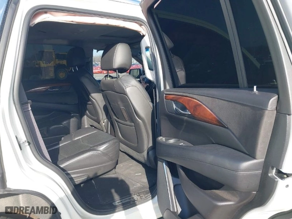2015 Cadillac Escalade Luxury with VIN 1GYS4BKJ4FR245431, listed as a IAAI auction lot 41525919 with 120,429 mi miles. Bid and sale history available at carsss.com. Image 8.