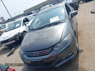 2010 Honda Insight EX with VIN JHMZE2H71AS043465, listed as a IAAI auction lot 42312556 with 151,009 mi miles and . Bid and sale history available at DreamBid. Image 12.