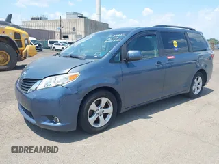 2015 Toyota Sienna LE AAS with VIN 5TDKK3DC1FS642029, listed as a IAAI auction lot 42618738 with 201,344 mi miles and . Bid and sale history available at DreamBid. Image 2.