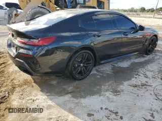 2024 BMW 8 Series 840i with VIN WBAGV2C07LCE26407, listed as a Copart auction lot 76743714 with 44,037 mi miles and Salvage Title. Bid and sale history available at carsss.com. Image 3.